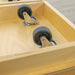 Two wheels attached to a wooden frame, likely for mobility.