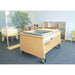 Wooden mobile cart with sensory bins in a classroom setting